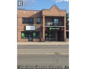 A building with a sign that says H&R Block.