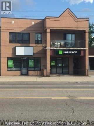 A building with a sign that says H&R Block.