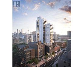 A modern high-rise building is the centerpiece of a city skyline.