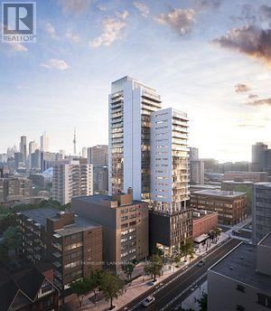 A modern high-rise building is the centerpiece of a city skyline.