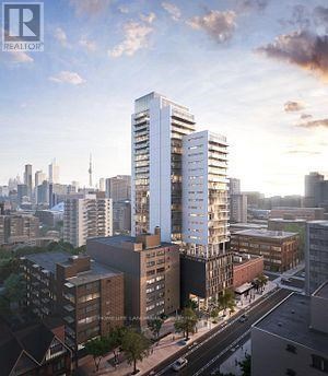 A modern high-rise building is the centerpiece of a city skyline.