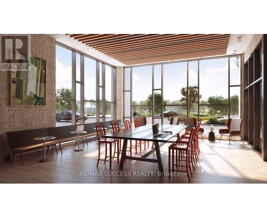 A modern dining room with a large table and chairs.