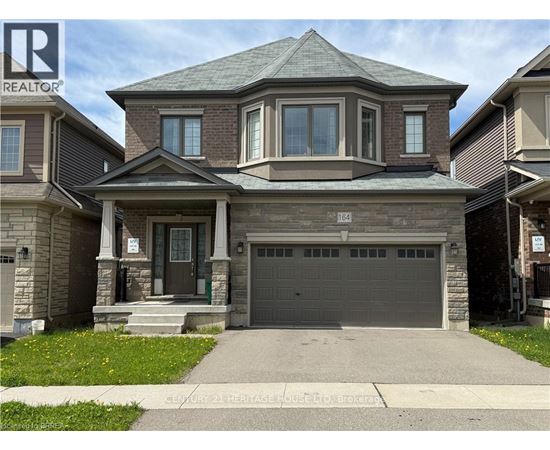 A house with a garage is for sale.