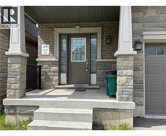 A house with a sign that says "Lot 21" on the front door.