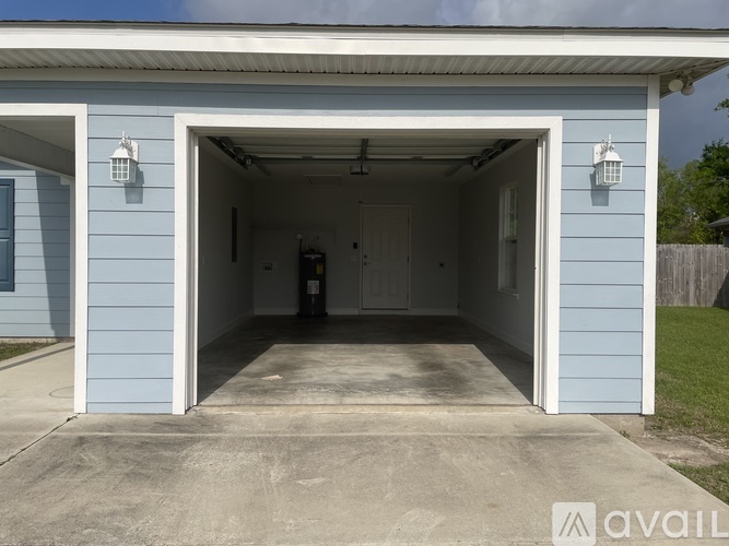 A garage with a white door is available for rent.