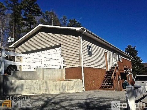 A building with a sign that says Georgia MLS on it.
