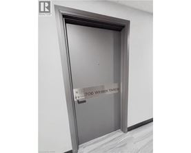 A door with a sign that says 706 Weber Yards.