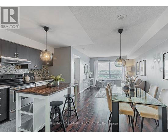 A modern kitchen with a dining table set for four.