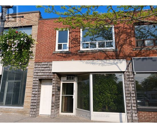 A building with a sign that says Brokerage.