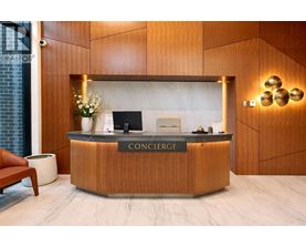A reception desk with the word Concierge on it.