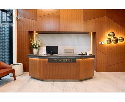 A reception desk with the word Concierge on it.