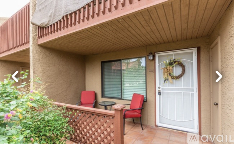 A patio with a table and chairs is visible.