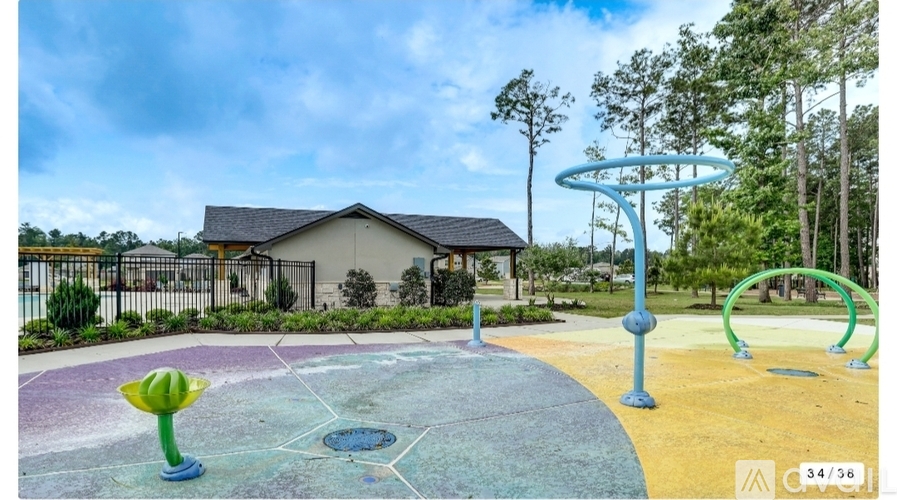 A playground with a slide, swings, and a climbing frame.