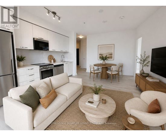 A modern living room with a white couch and a coffee table.