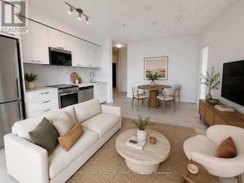A modern living room with a white couch and a coffee table.
