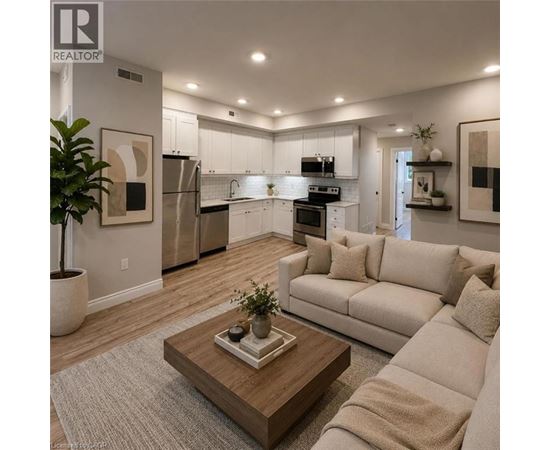 A modern living room with a coffee table in the center.