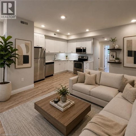 A modern living room with a coffee table in the center.