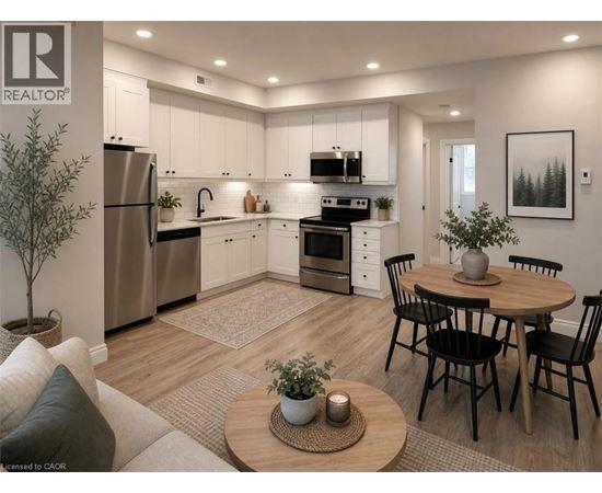 A well-lit kitchen with a dining table set for four.