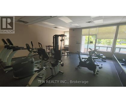 A gym with treadmills and elliptical machines is for sale.