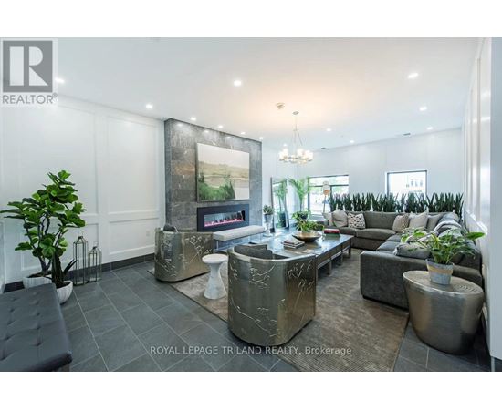 A living room with a grey sofa and a coffee table.