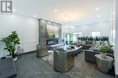 A living room with a grey sofa and a coffee table.