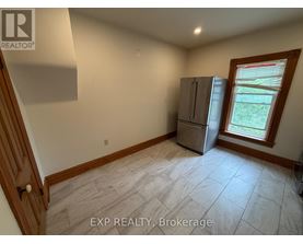 A room with EXP REALTY, Brokerage watermark on the floor.