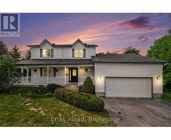 A house with a white exterior and a black roof is shown with the text "Enas Award, Brokerage" in the foreground.