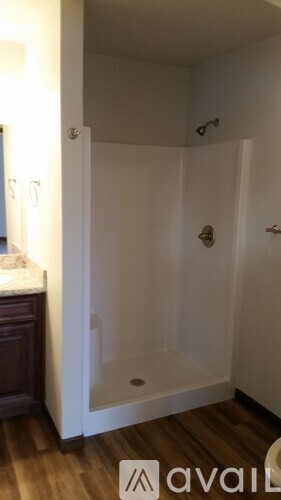 A small bathroom with a walk in shower.