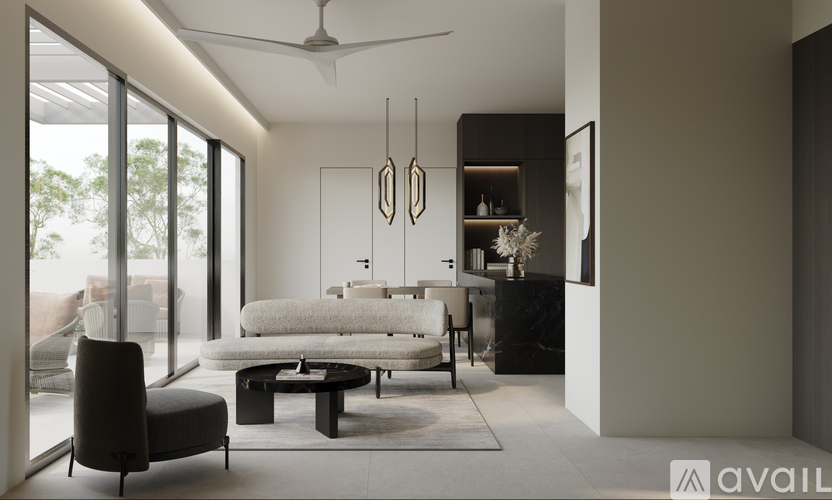 A modern living room with a black chair and a white sofa.