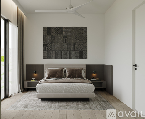 A modern bedroom with a large bed and a large artwork on the wall.