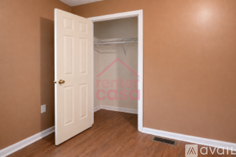 A room with a white door and a sign that says "renters can.".