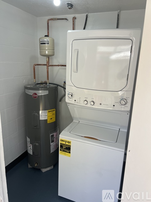 A washer and dryer in a small room.