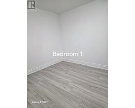 Bedroom 1 with Galaxy Z Fold7 flooring.