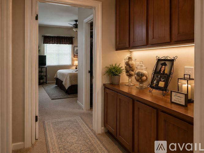 A bedroom with a bed and a window with curtains.