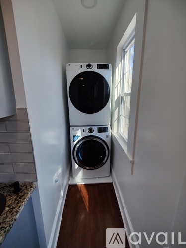 A washer and dryer in a small laundry room.
