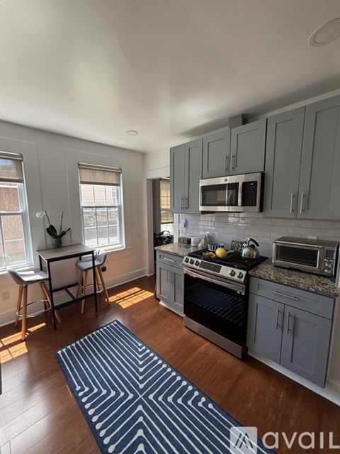 A washer and dryer in a small laundry room.