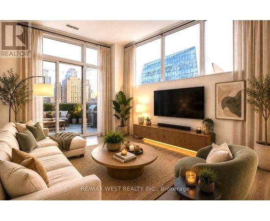 A well-lit living room with a large window and a flat screen TV.