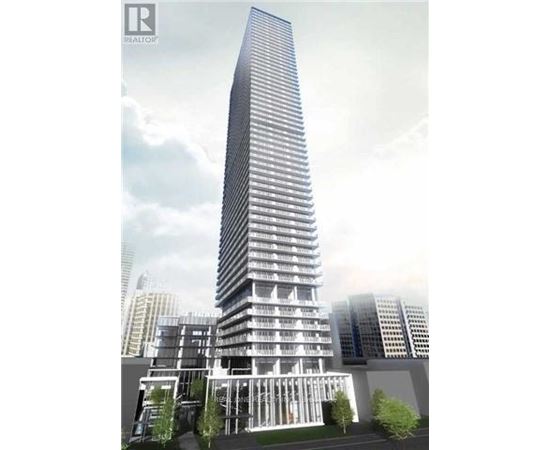 A tall, modern building with a glass facade and a curved section at the bottom.