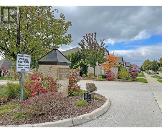 A sign in front of a house states that it is private property and not to be invaded.