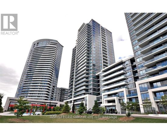 A real estate company logo is displayed in front of a modern residential building.
