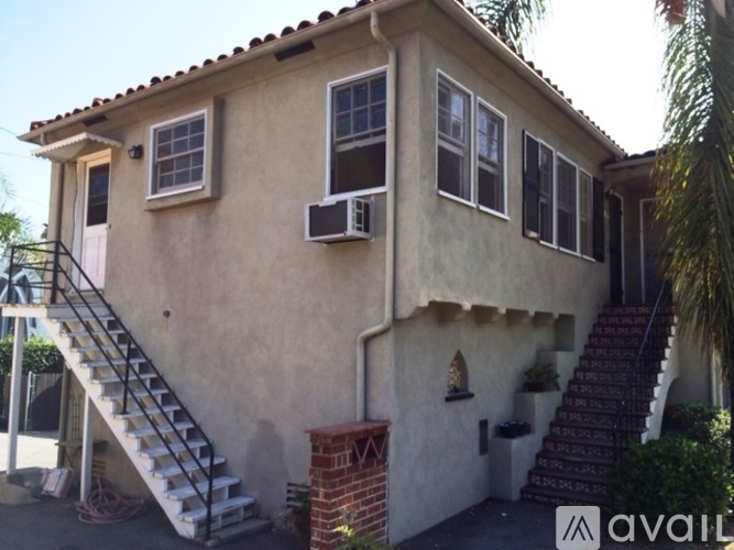 A house with a staircase leading to the second floor.