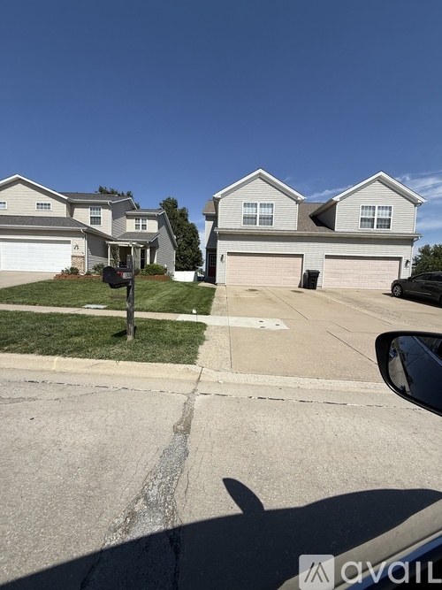 A house with a driveway in front of it.