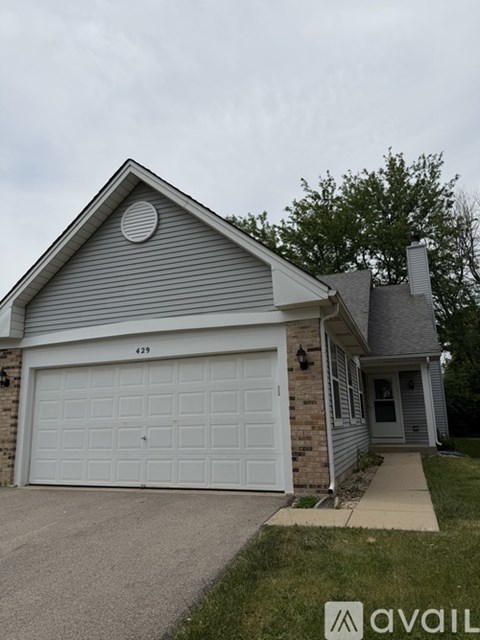 A house with the number 429 on the garage door.