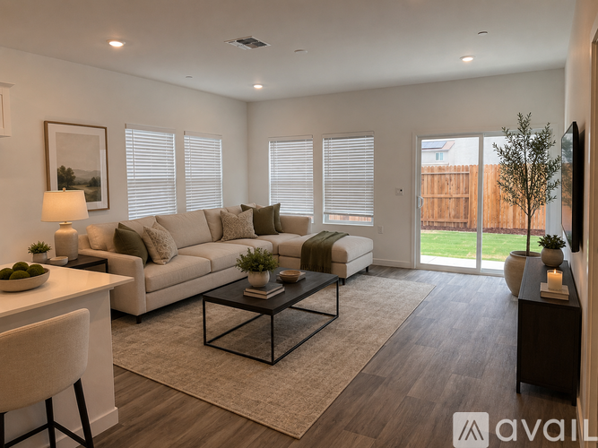 A room with a desk, chair, and shelves with various items.