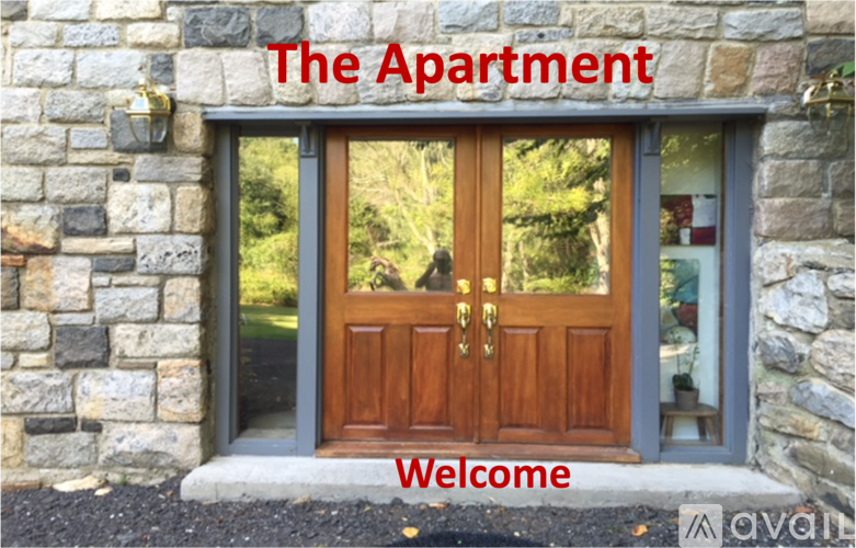 The apartment building is welcoming people to enter.
