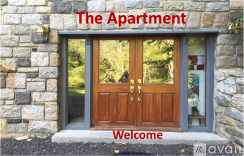 The apartment building is welcoming people to enter.