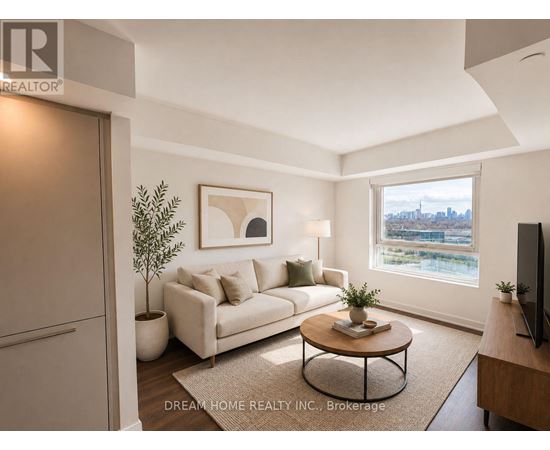 A living room with a white couch, a coffee table, and a window with a view of the city.