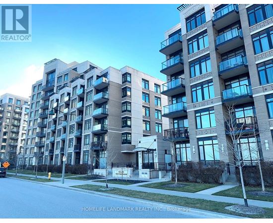 A street view of a residential area with apartment buildings.