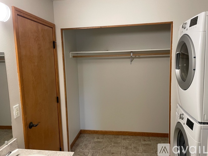 A laundry room with a washer and dryer.