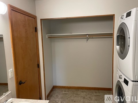 A laundry room with a washer and dryer.